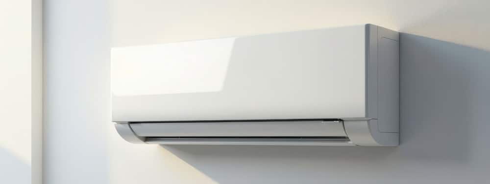 A ductless mini-split unit installed on a wall.